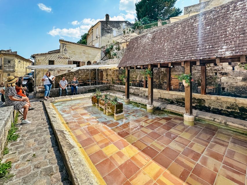 From Bordeaux: Saint-Emilion Guided Wine Tasting Tour - Winery stop two: aperitif, cheese, and that family-run feel