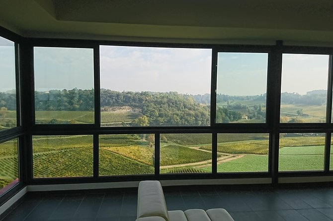 Full-day wine tour in Saint-Emilion (Premium Sedan) - Stop 3: Office de Tourisme du Grand Saint-Emilionnais and Monk Emilion views