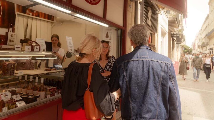 Walking Tour in Bordeaux with Tastings and Stories - Where the walk starts: Porte Dijeaux and the best way to read Bordeaux